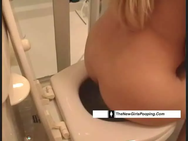 Rear view of a girl pooping 