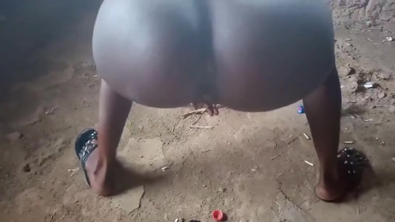 African Scat Porn - African slut poops in an abandoned building